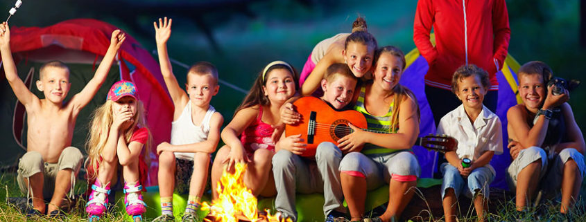 kids around campfire at summer camp