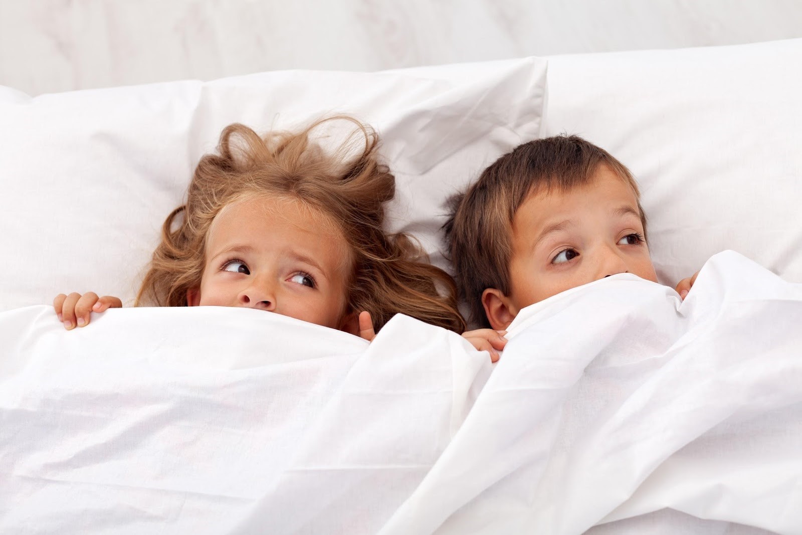1 Kids in bed afraid because they do not know how to get rid of lice
